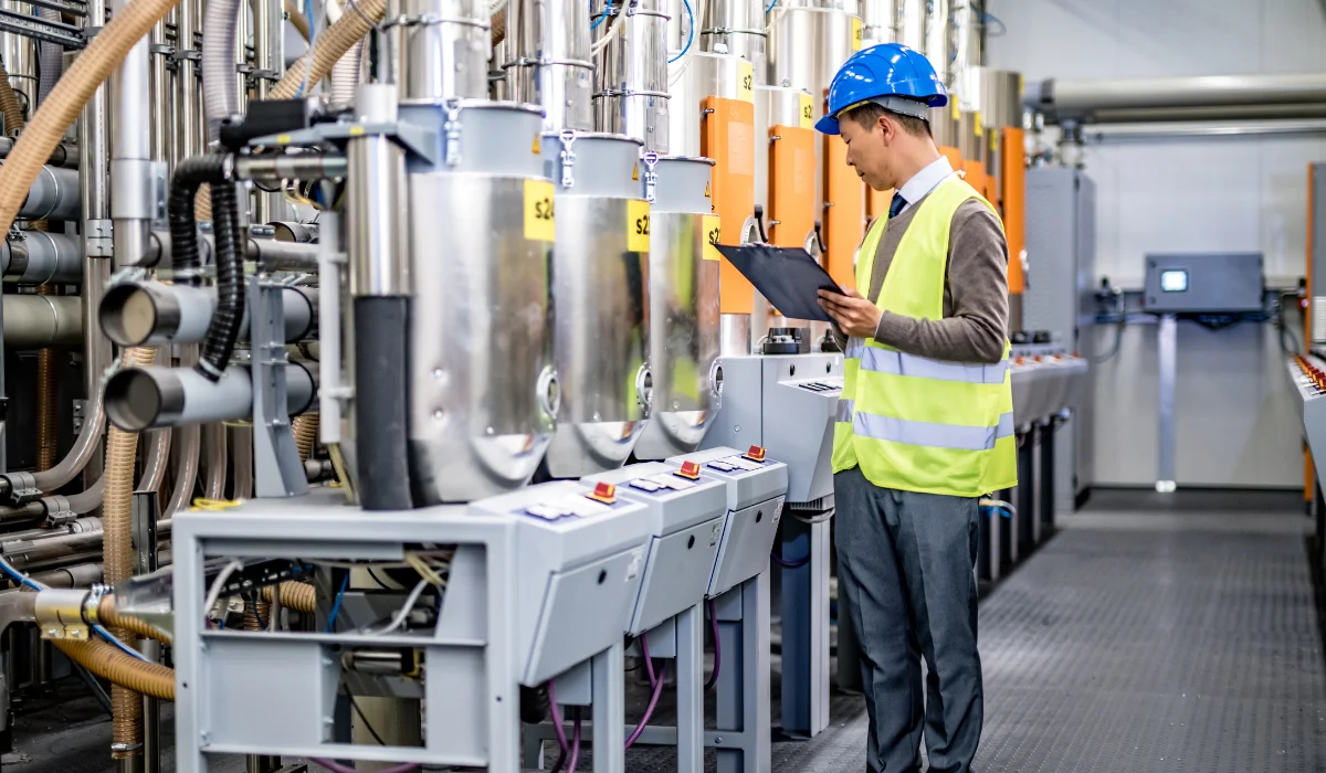 engineer checking vessels in factory